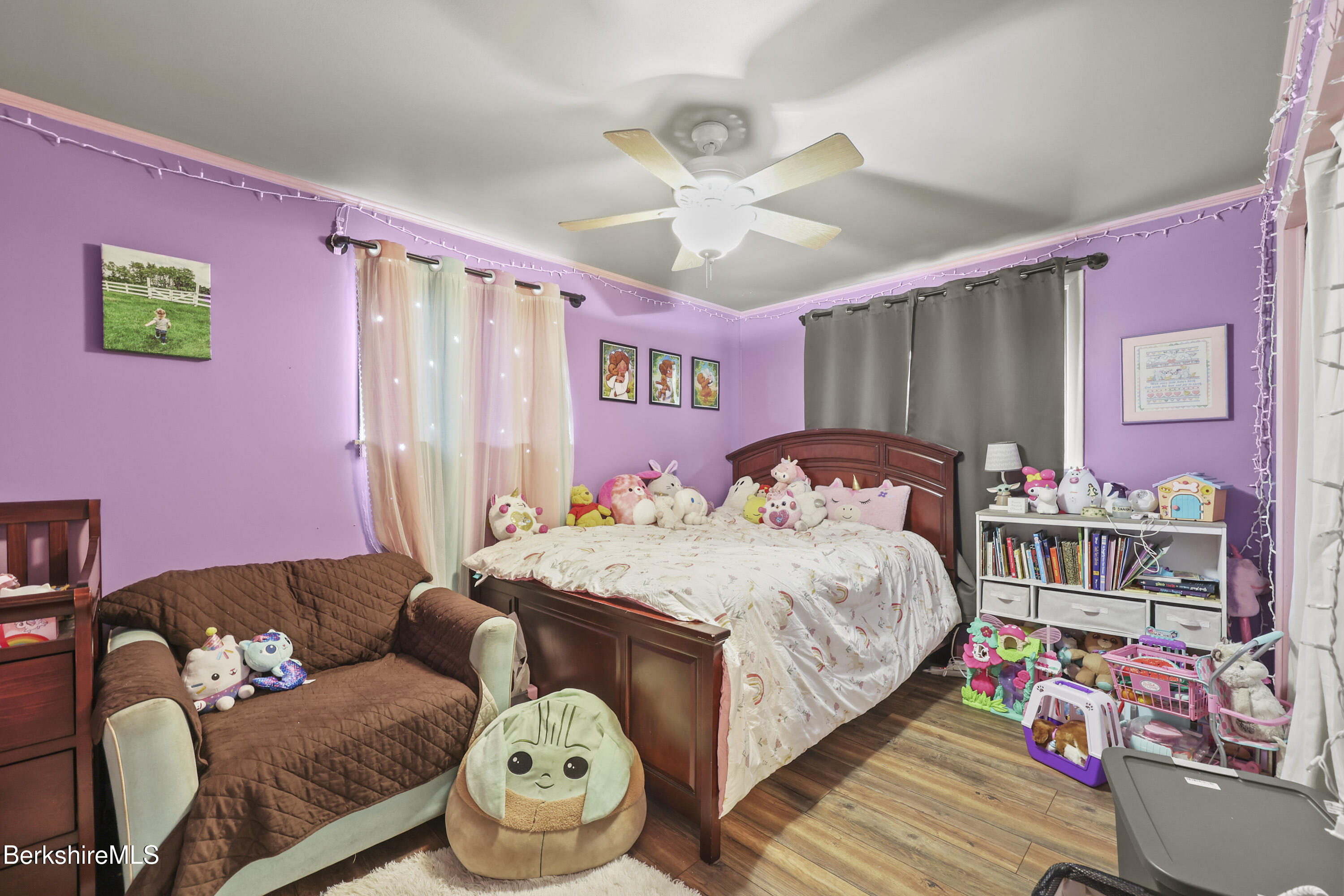 490 Kirchner Road Dalton, MA 01226 - Photo 17 of 30 a bedroom with bed and a chandelier