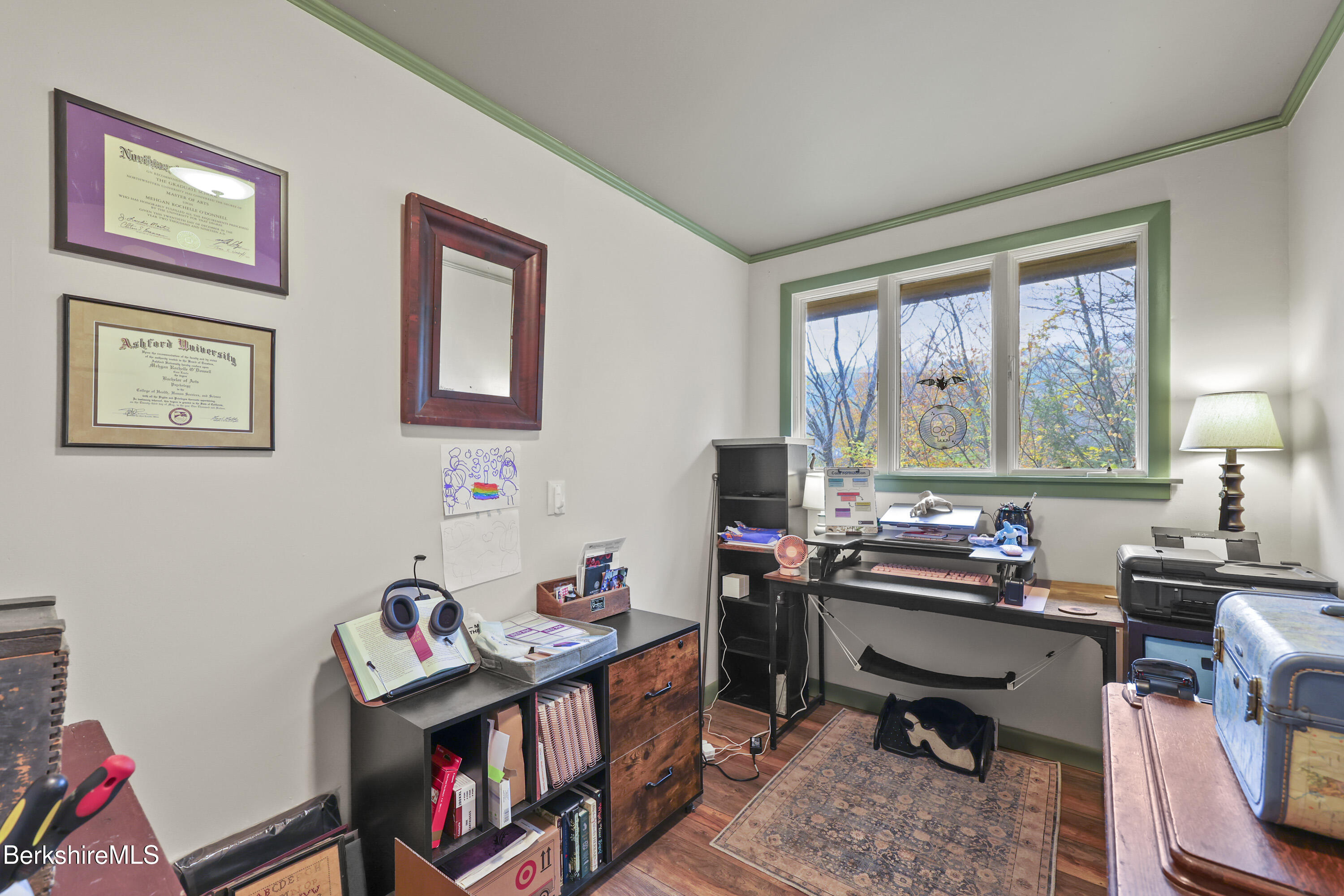 490 Kirchner Road Dalton, MA 01226 - Photo 19 of 30 a room with furniture a bookshelf and a window