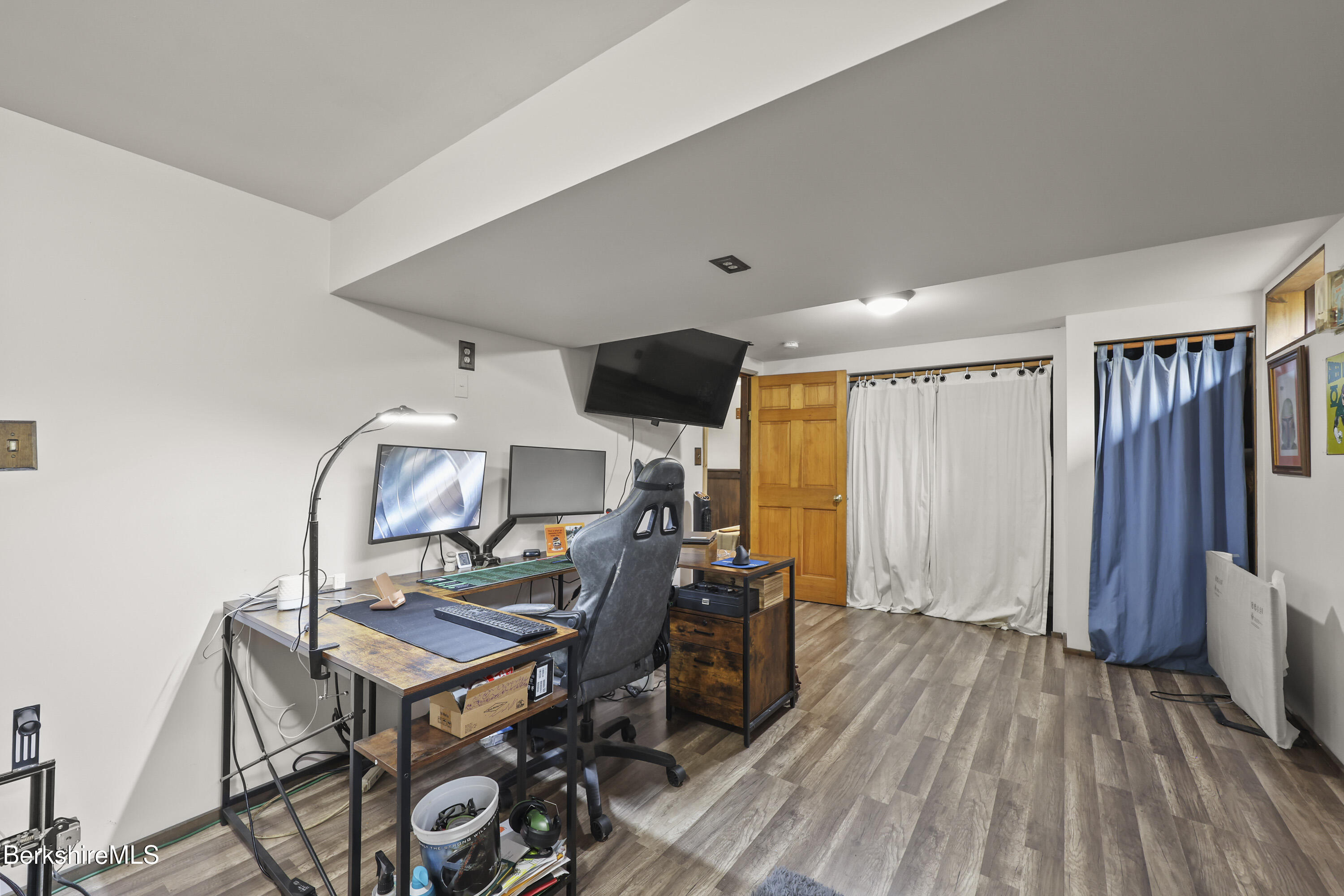 490 Kirchner Road Dalton, MA 01226 - Photo 23 of 30 a view of a workspace with furniture and wooden floor