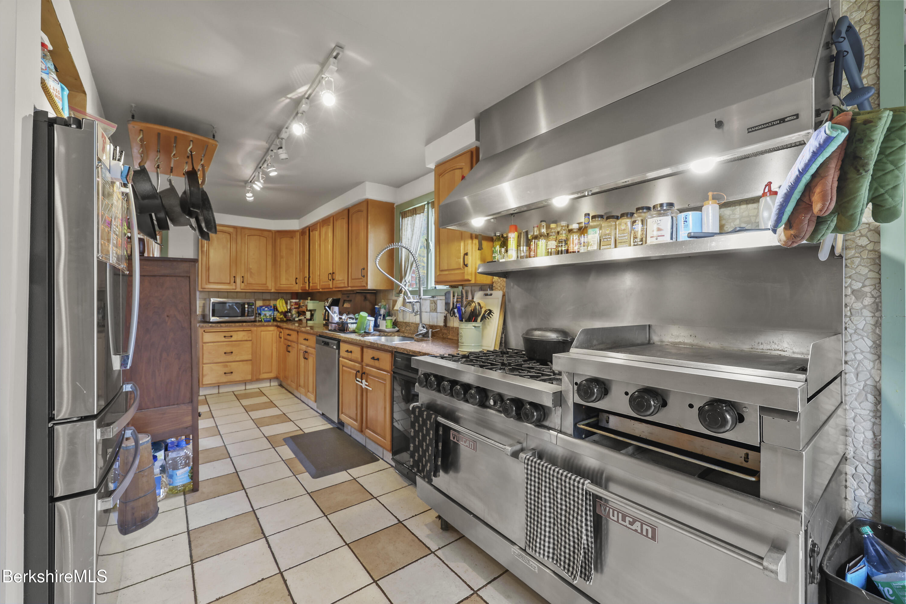 490 Kirchner Road Dalton, MA 01226 - Photo 4 of 30 a kitchen with a stove and a refrigerator