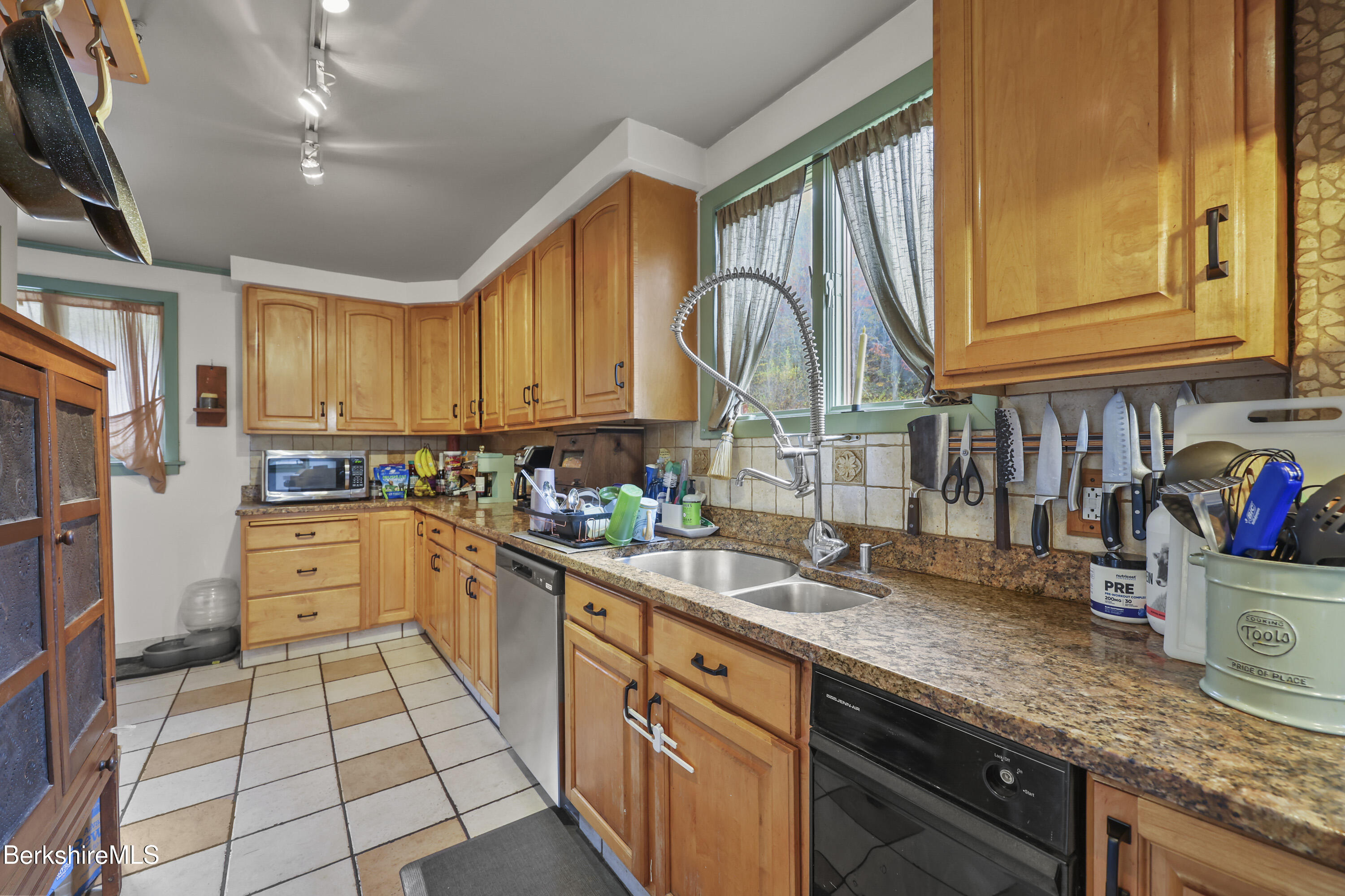 490 Kirchner Road Dalton, MA 01226 - Photo 5 of 30 a kitchen with stainless steel appliances granite countertop a sink and cabinets