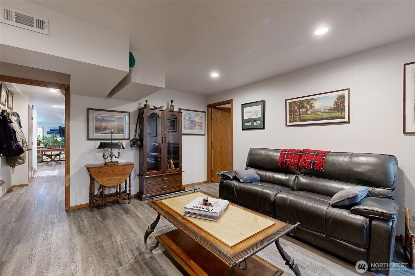 2425 Country Club Road Walla Walla, WA 99362 - Photo 24 of 39 a living room with furniture and a wooden floor