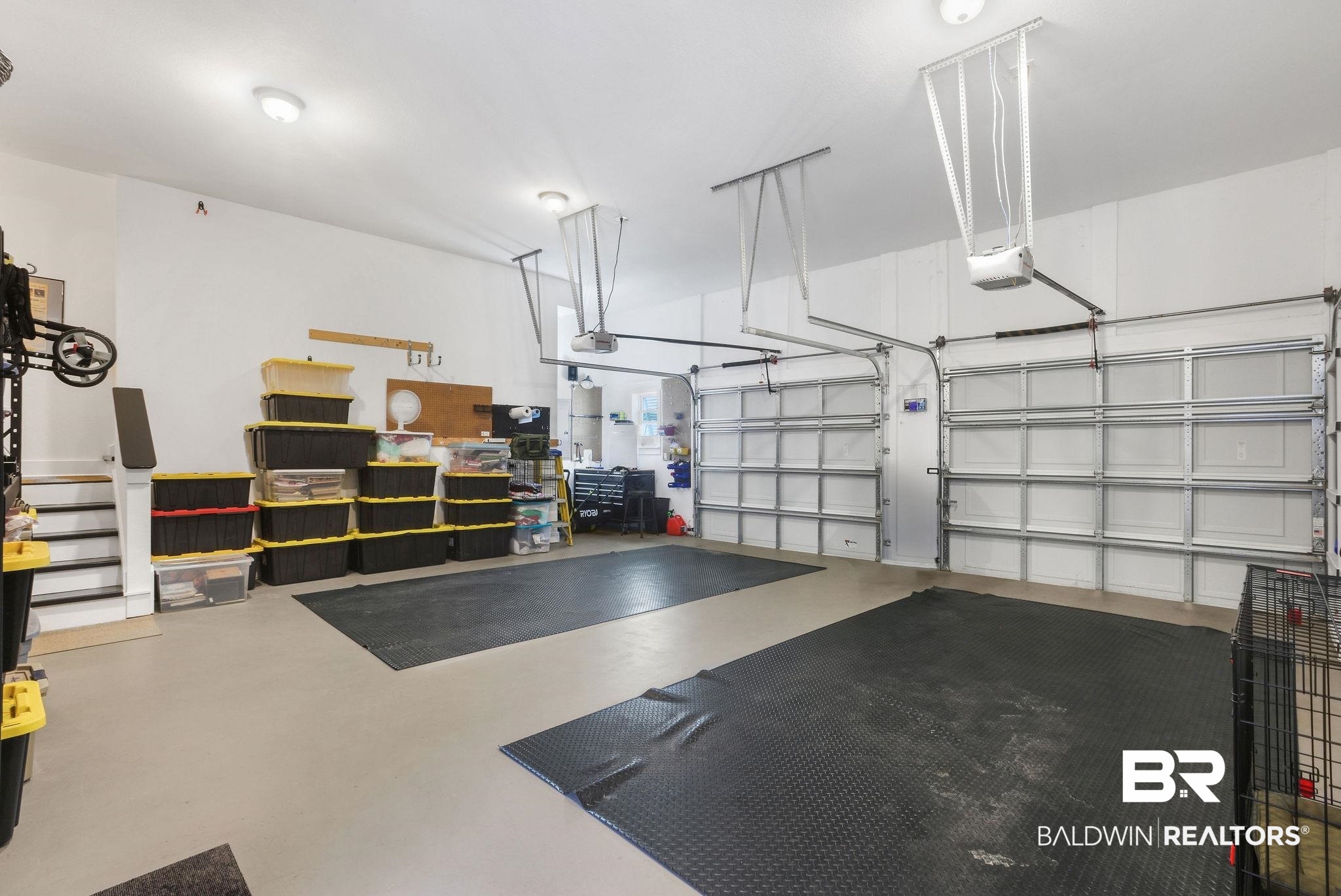 1116 Pink Poppy Lane Foley, AL 36535 - Photo 25 of 33 Garage with a garage door opener
