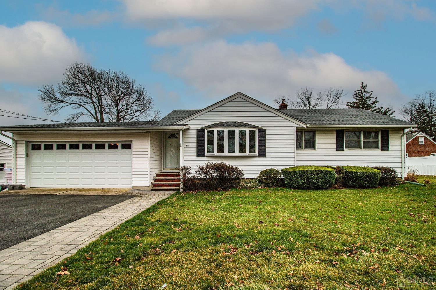 25 Maple Road Iselin, NJ 08830 - Photo 1 of 1 a house view with a garden space