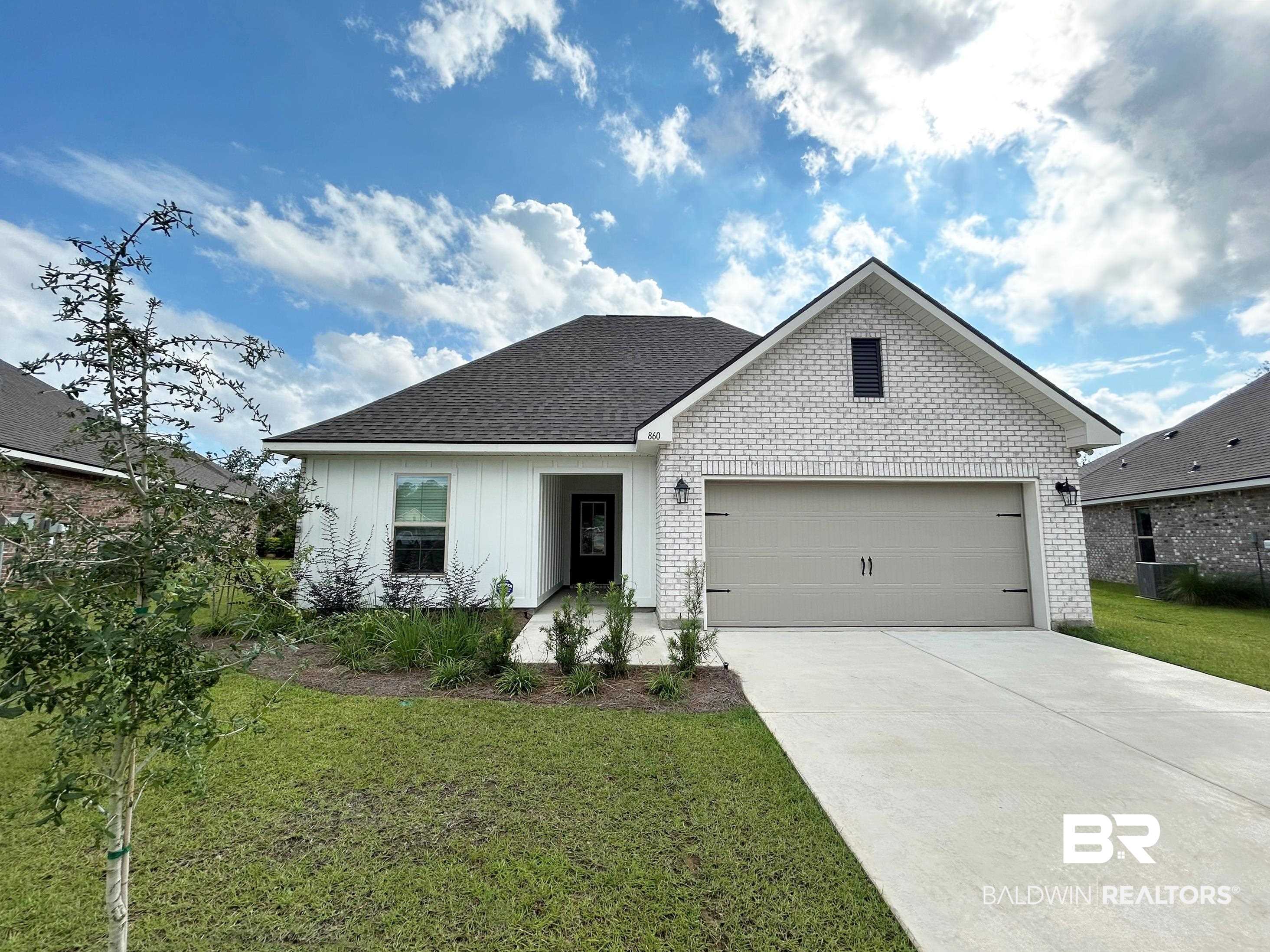 860 Sumter Loop Foley, AL 36535 - Photo 1 of 26 View of front of property featuring a front lawn and a garage