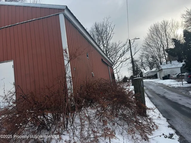 a view of a back yard of the house