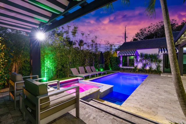 a view of a pathway with a garden