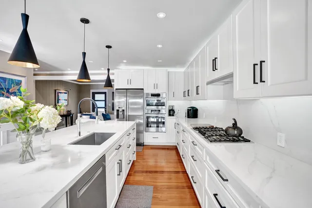 a bedroom with a bed and a mirror