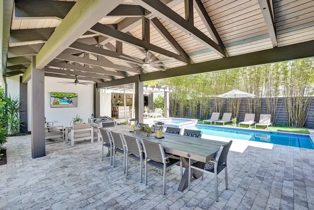 a wooden bench sitting in the middle of a park