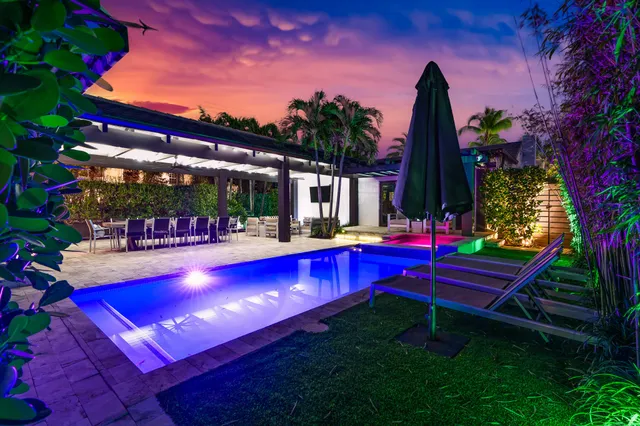 a view of yard with patio