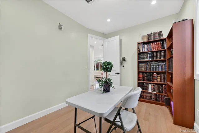 a view of a workspace with furniture