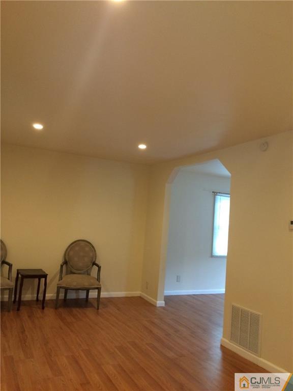 534 Chain O' Hills Road Colonia, NJ 07067 - Photo 4 of 6 a view of livingroom with furniture and wooden floor