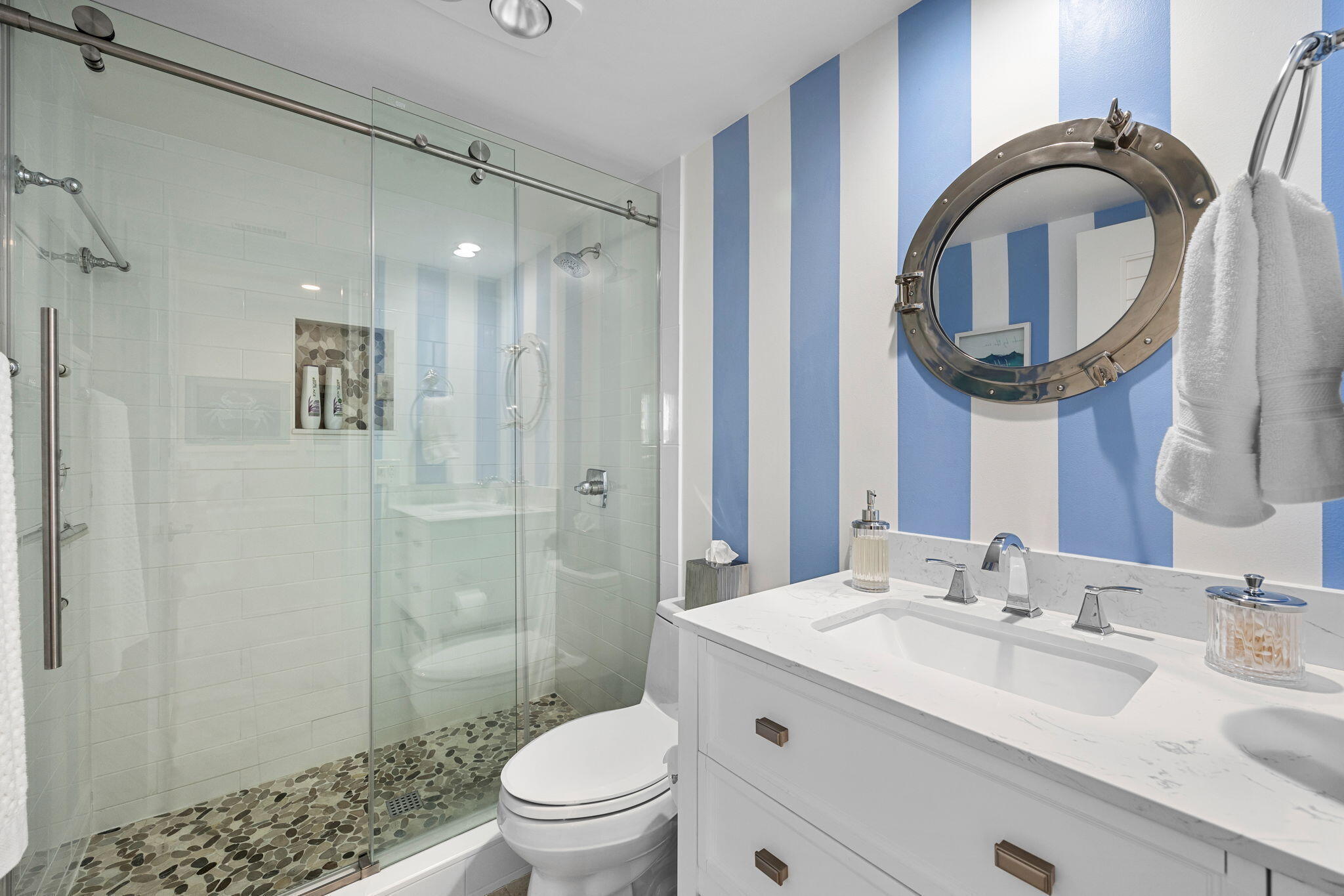 375 South Beach Road, Unit 802 Tequesta, FL 33469 - Photo 25 of 39 a bathroom with a granite countertop sink a toilet and a mirror