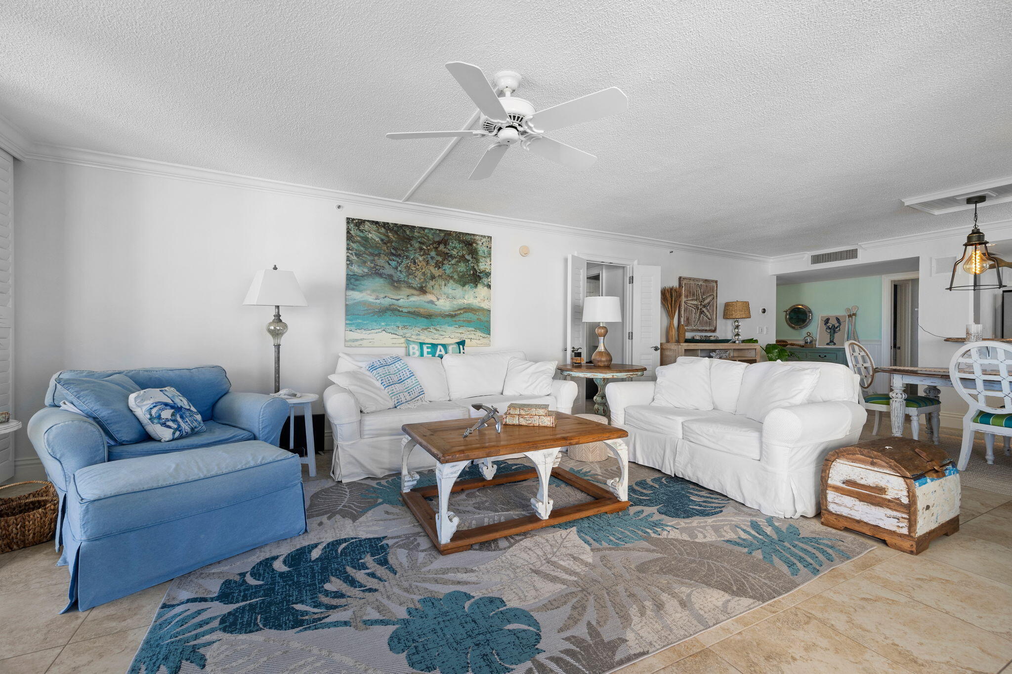 375 South Beach Road, Unit 802 Tequesta, FL 33469 - Photo 6 of 39 a living room with furniture and a large window