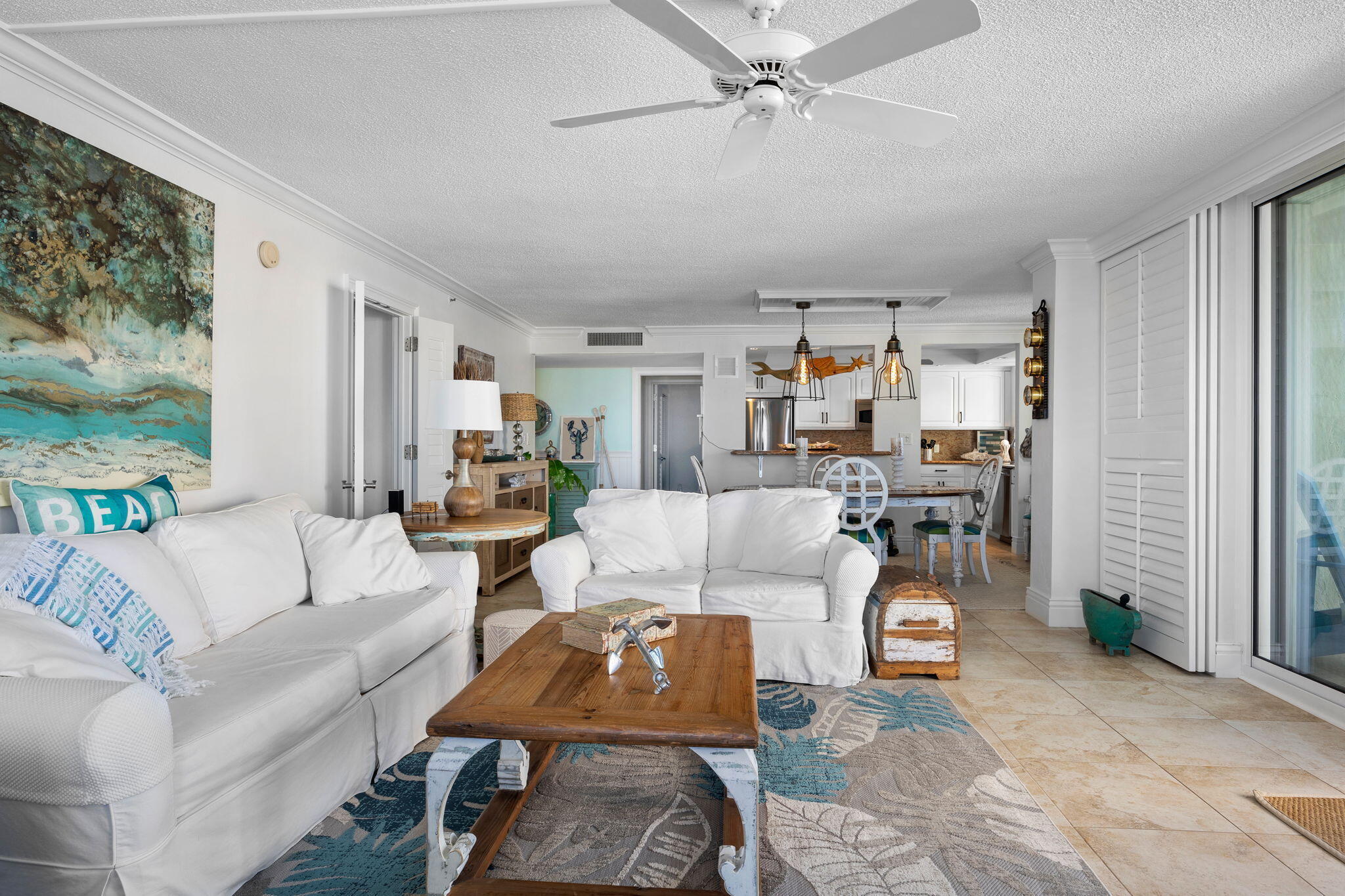 375 South Beach Road, Unit 802 Tequesta, FL 33469 - Photo 7 of 39 a living room with furniture and a large window