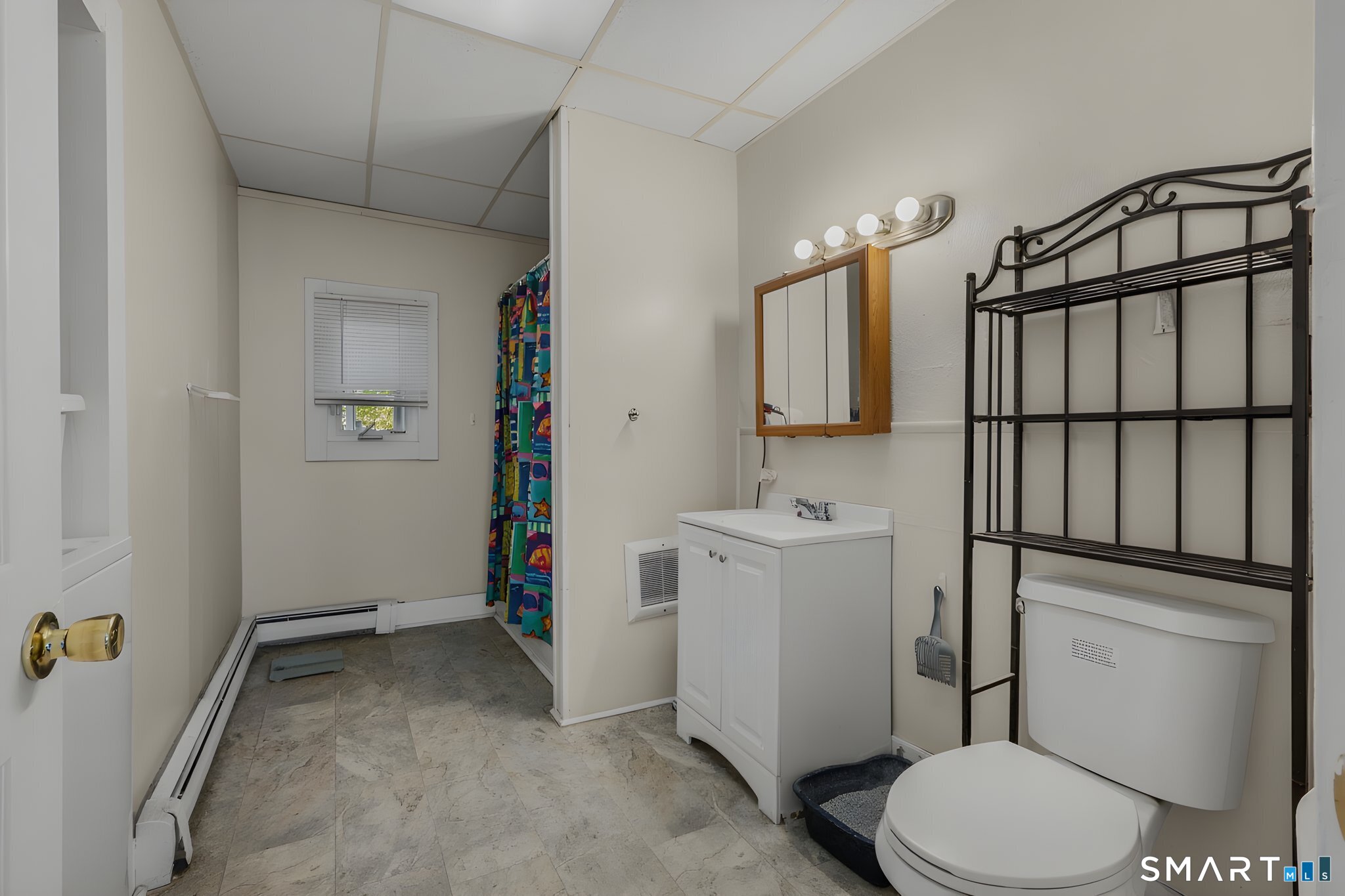 231 Poquonnock Road Groton, CT 06340 - Photo 12 of 30 a bathroom with a sink toilet and shower