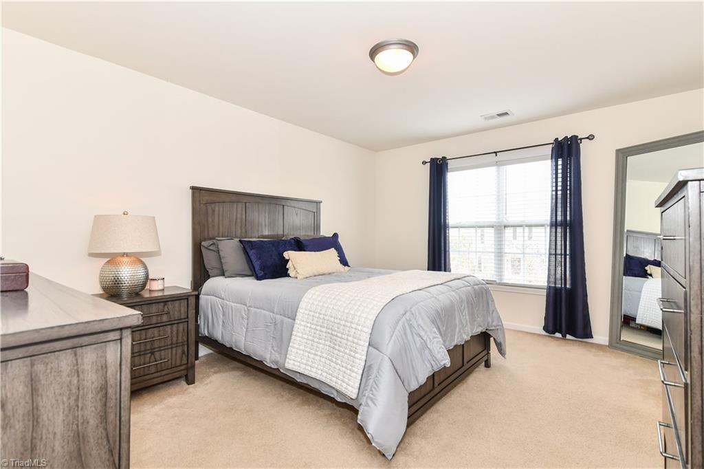467 Ansley Way High Point, NC 27265 - Photo 12 of 16 The master bedroom is simply impressive, offers great space and a wonderful en-suite full bath. Overhead lighting, double window, and walk in closet.