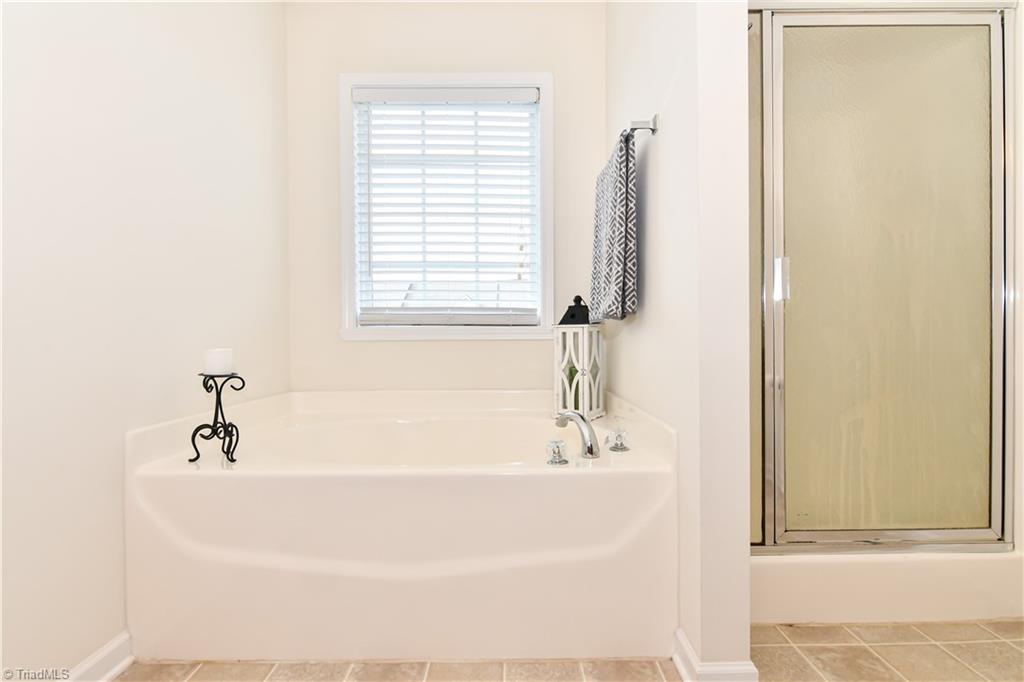 467 Ansley Way High Point, NC 27265 - Photo 14 of 16 View to show the relaxing tub and convenient walk in shower.