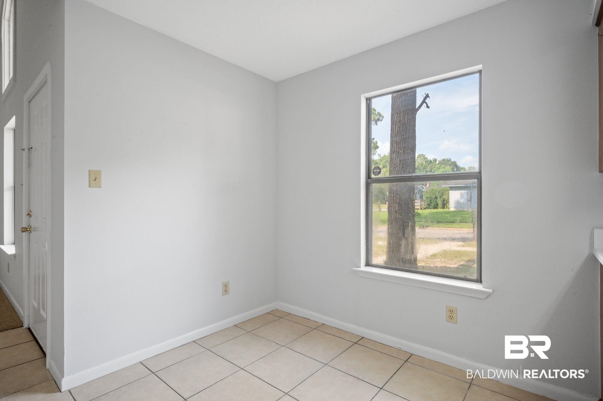 3701 Vista Ridge Drive Mobile, AL 36693 - Photo 14 of 33 Tiled spare room featuring a wealth of natural light