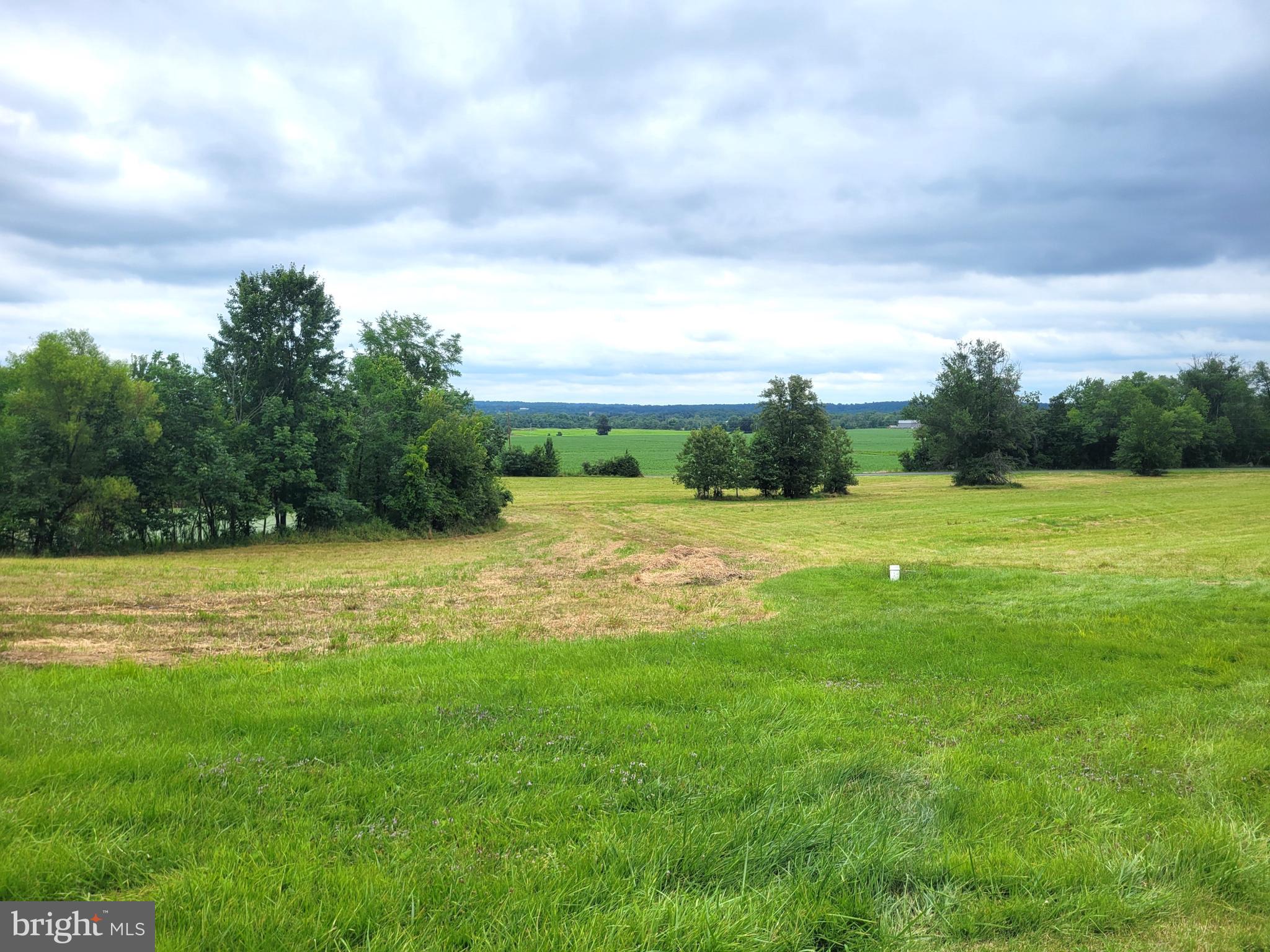 179 Topper Road Fairfield, PA 17320 - Photo 2 of 23 a view of a garden with a building in the background