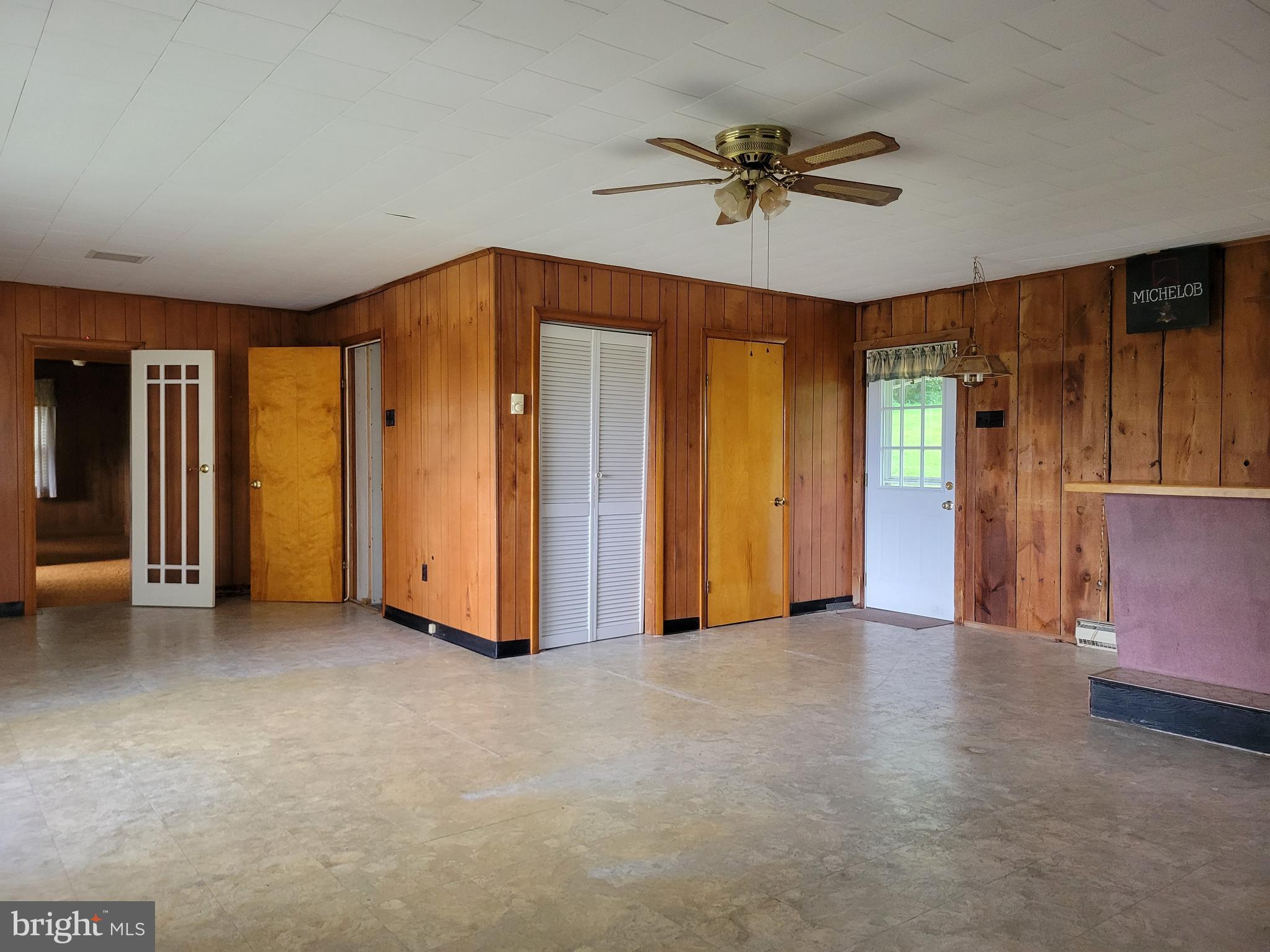 179 Topper Road Fairfield, PA 17320 - Photo 9 of 23 a view of an empty room with a ceiling fan