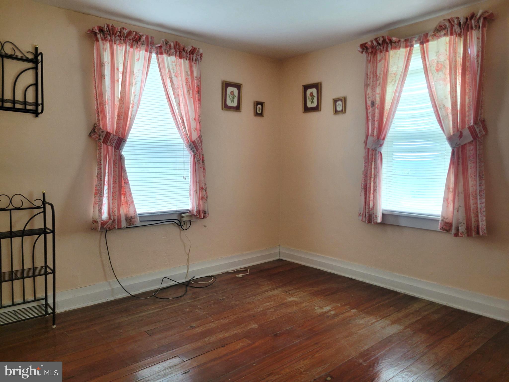 179 Topper Road Fairfield, PA 17320 - Photo 10 of 23 an empty room with wooden floor and windows
