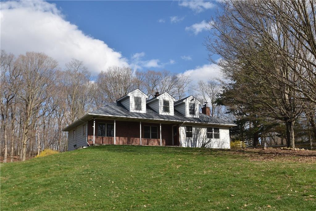 98 Spring Road North Haven, CT 06473 - Photo 1 of 1 a front view of a house with a garden