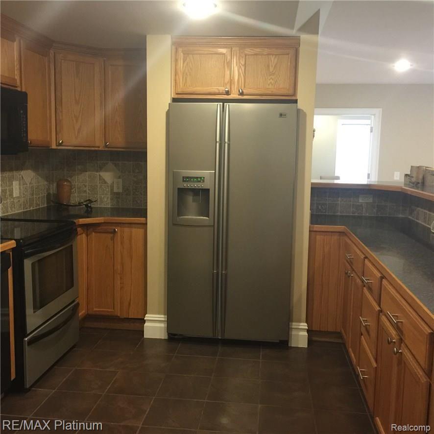 11661 Roberts Road Stockbridge, MI 49285 - Photo 50 of 53 Full Kitchen Lower Level