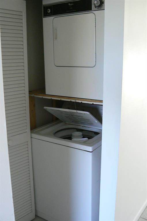 7652 Kimberly Boulevard, Unit 7652 North Lauderdale, FL 33068 - Photo 4 of 4 a close up view of washer and dryer