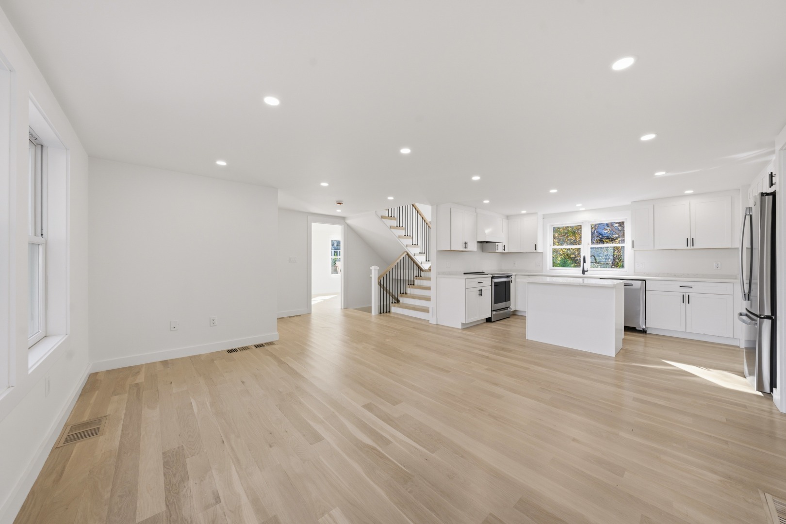 38 Hooper Farm Road Nantucket, MA 02554 - Photo 11 of 19 a view of a big room with wooden floor and windows