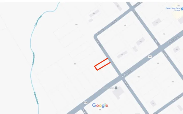 a view of a hallway with white walls