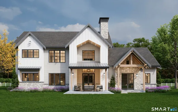 a front view of house with yard and green space