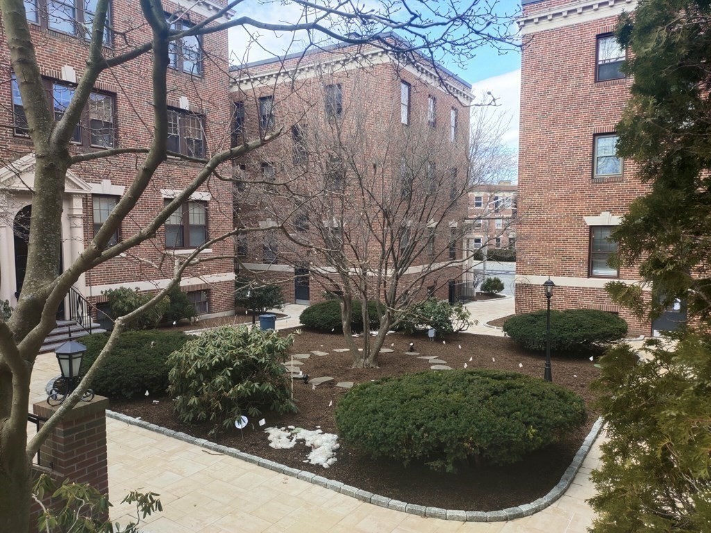 1986 Commonwealth, Unit 4 Boston, MA 02135 - Photo 10 of 10 a view of a yard in front of a house
