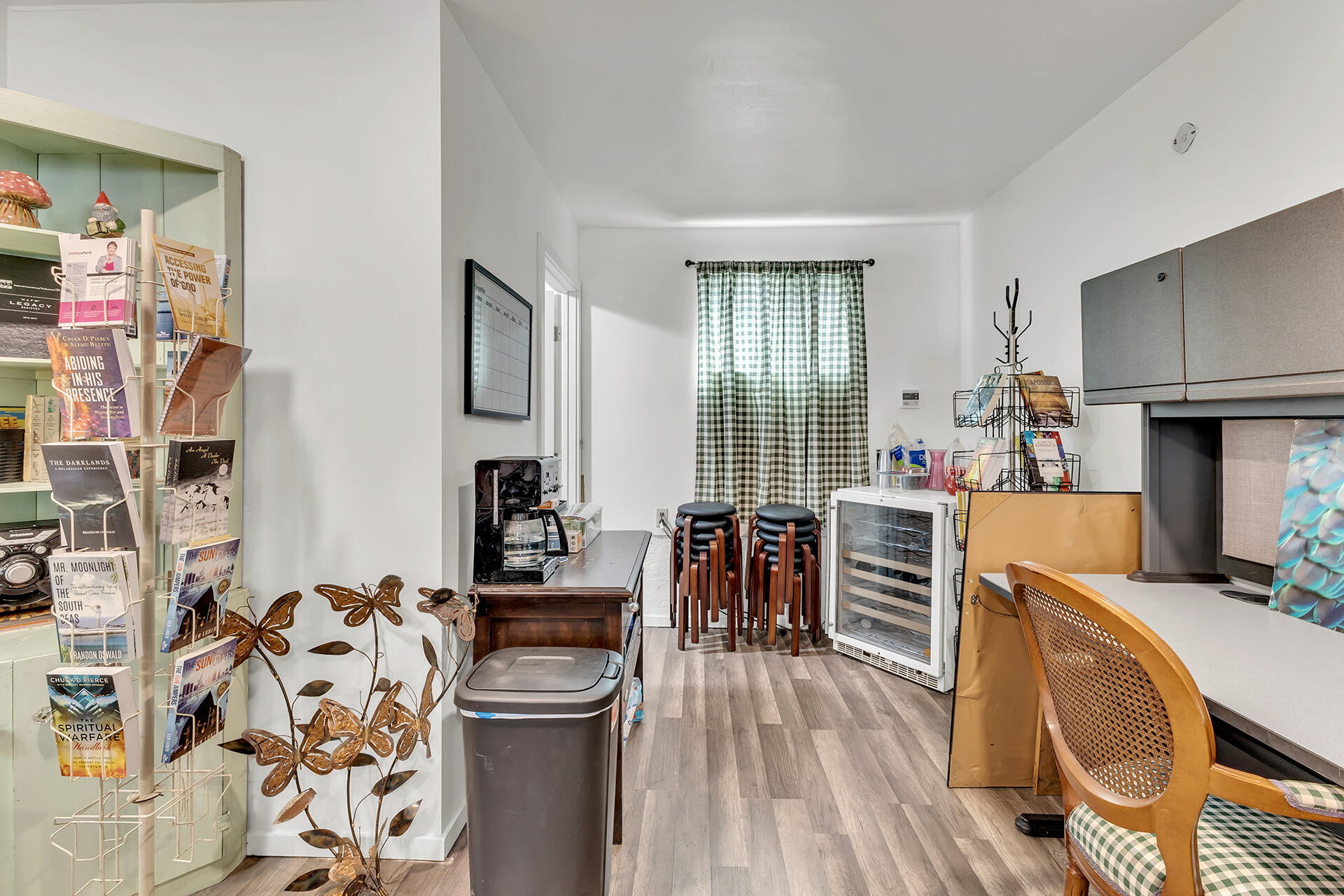 54585 North Circle Drive Idyllwild, CA 92549 - Photo 13 of 58 a kitchen with stainless steel appliances kitchen island granite countertop a refrigerator a stove top oven a dining table and chairs with wooden floor