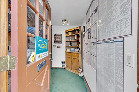 a view of a building with a street