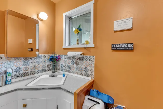 a view of a street with houses on both side