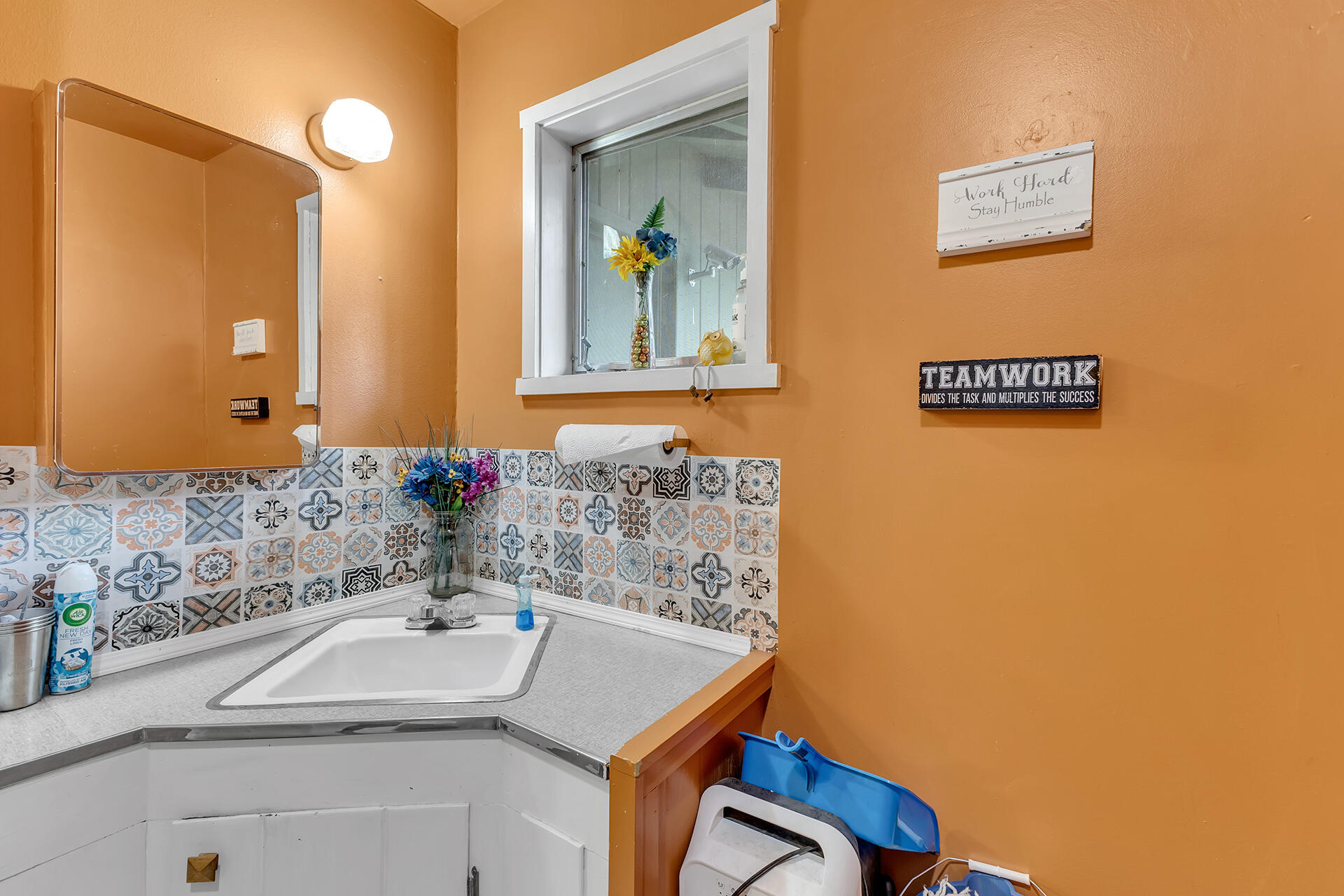 54585 North Circle Drive Idyllwild, CA 92549 - Photo 49 of 58 a bathroom with a sink and a mirror
