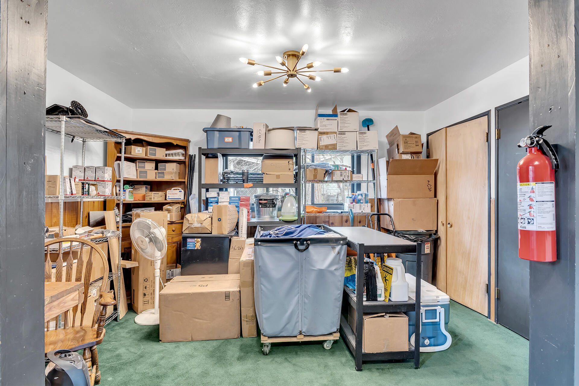 54585 North Circle Drive Idyllwild, CA 92549 - Photo 50 of 58 a living room with furniture and a chandelier