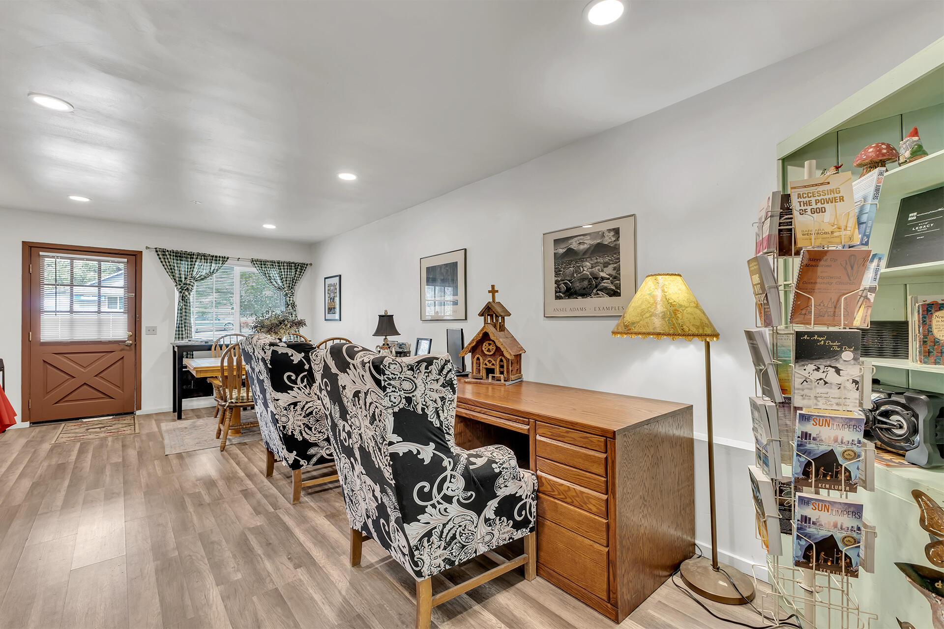 54585 North Circle Drive Idyllwild, CA 92549 - Photo 8 of 58 a very nice looking living room with dining room and wooden floor