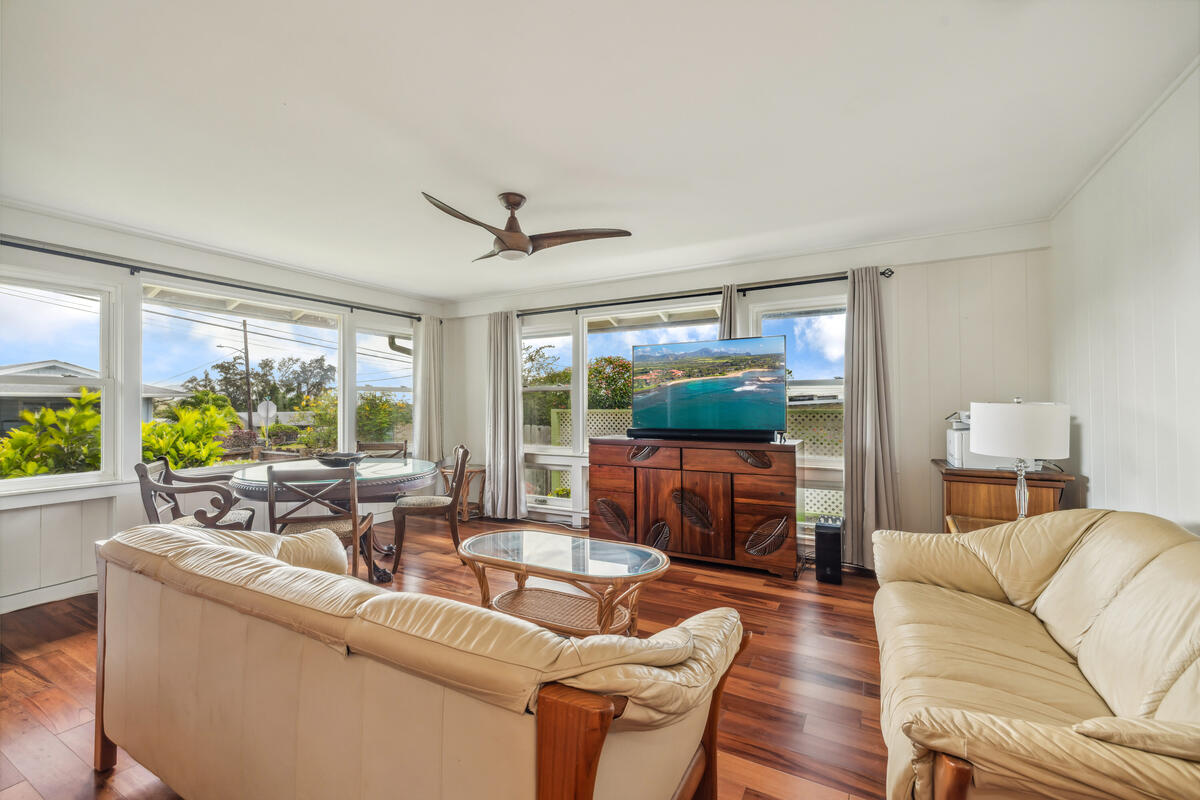 3567 Waha Road Kalaheo, HI 96741 - Photo 5 of 25 a living room with furniture and a large window