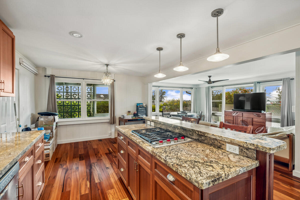 3567 Waha Road Kalaheo, HI 96741 - Photo 8 of 25 a living room with furniture and a wooden floor