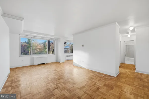 a view of an empty room with a window