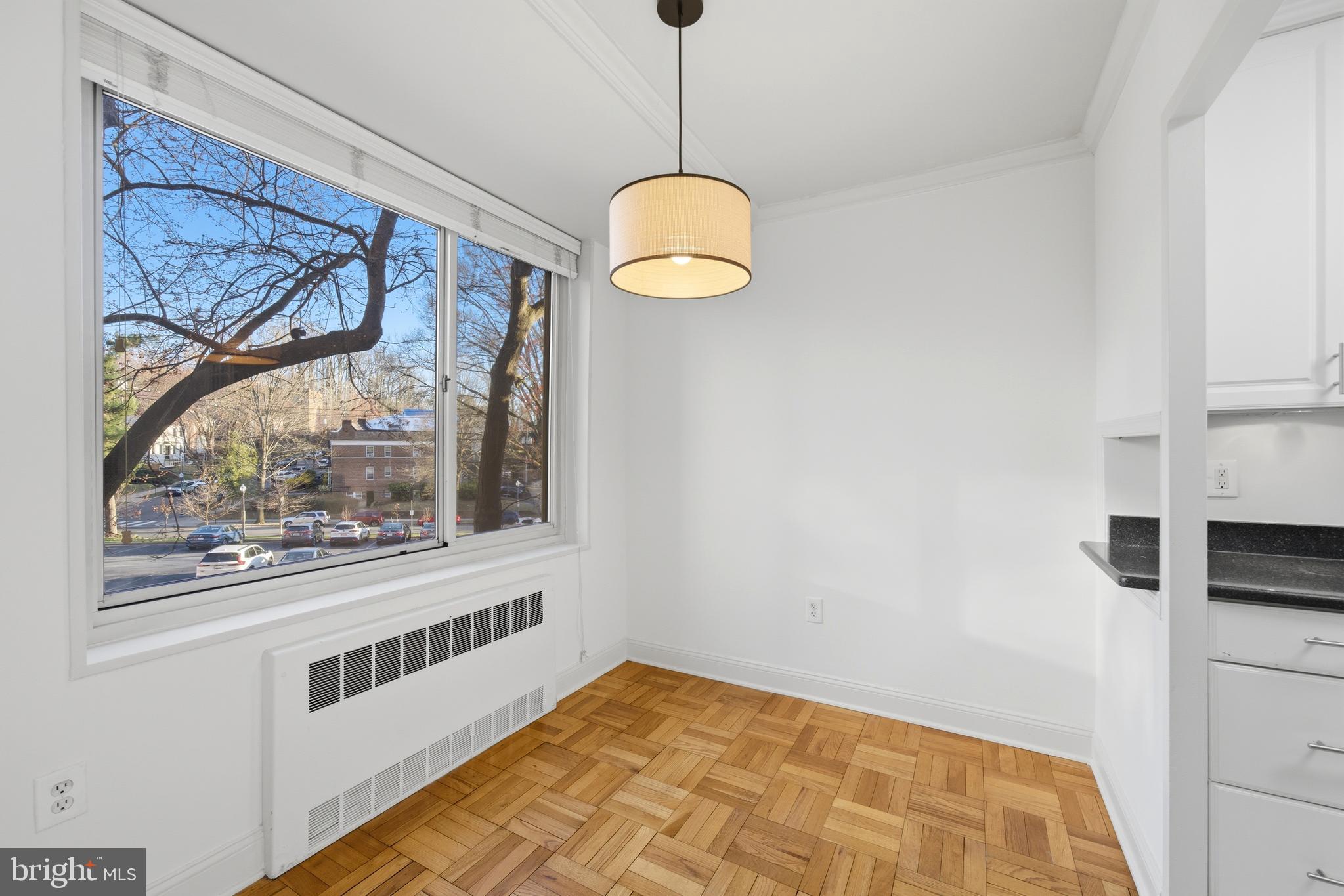 4000 Tunlaw Road Northwest, Unit 220 Washington, DC 20007 - Photo 16 of 30 a view of a big room with wooden floor and windows