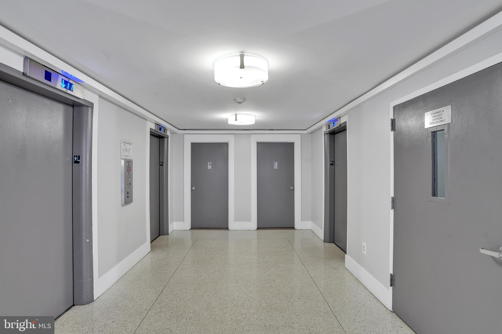 4000 Tunlaw Road Northwest, Unit 220 Washington, DC 20007 - Photo 9 of 30 a view of a hallway with front door