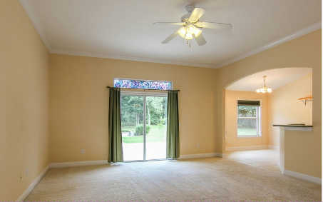 96486 Chester Road Yulee, FL 32097 - Photo 3 of 23 a view of an empty room with a window