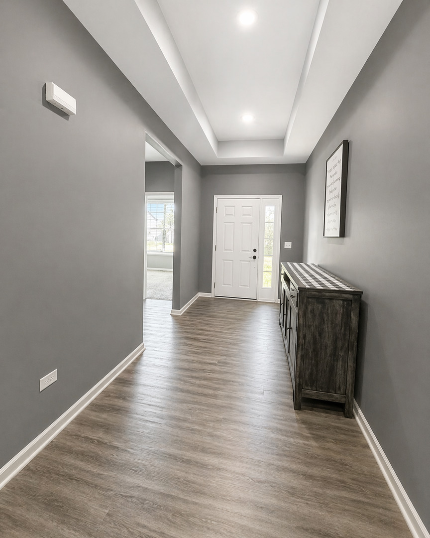 713 Long Ridge Trail Minooka, IL 60447 - Photo 12 of 40 a view of a livingroom with wooden floor