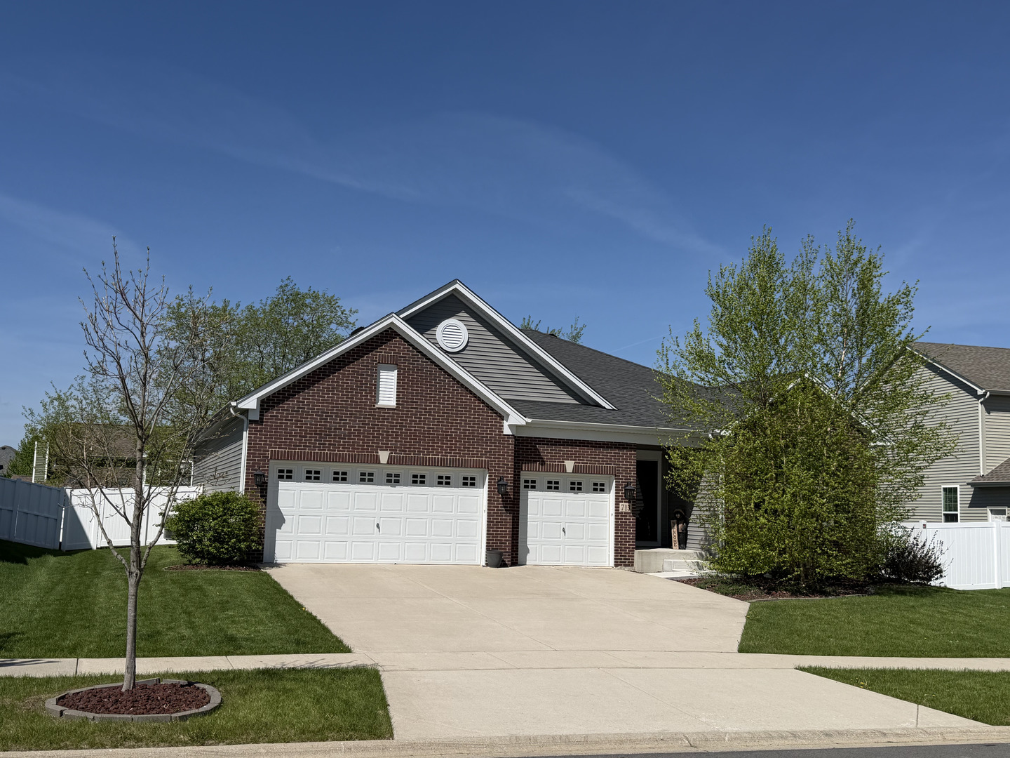 713 Long Ridge Trail Minooka, IL 60447 - Photo 2 of 40 a front view of a house with a yard