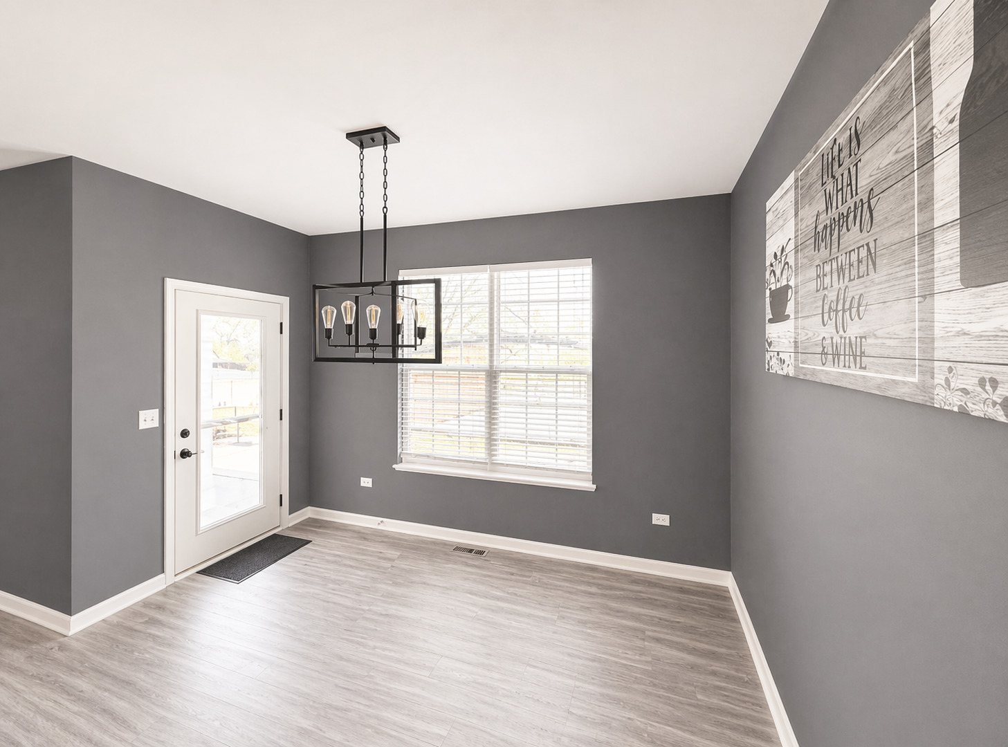 713 Long Ridge Trail Minooka, IL 60447 - Photo 22 of 40 a view of an empty room with wooden floor and a window