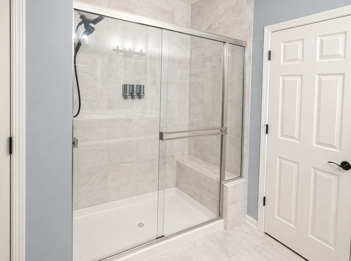 713 Long Ridge Trail Minooka, IL 60447 - Photo 33 of 40 a bathroom with a glass shower door