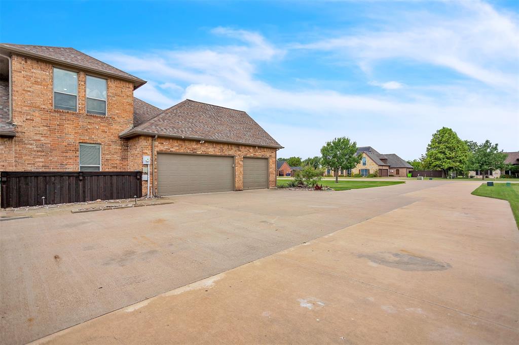 12286 Emerald Ranch Lane North Forney, TX 75126 - Photo 5 of 40 front view of a house with a street